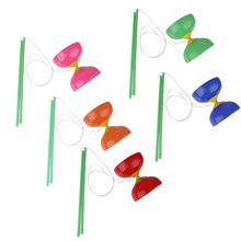 Diabolo Plactic con palos de mano y cuerda, juego de malabarismo-diabolo tradicional de plástico verde con palos de mano y cuerda 2024 - compra barato