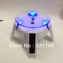 Free Shipping Solar Powered Turn Table / Rotary Display with LED Light/watch cell phone dislay stand 10PCS 2024 - buy cheap
