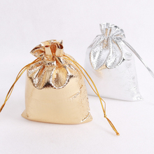 Bolsas de satén dorado de 5x7cm para embalaje de joyas y pendientes, Mini bolsa de regalo con cordón, venta al por mayor, 100 unids/lote 2024 - compra barato