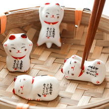 Soporte de palillos de gato de la suerte, estante de cerámica, decoración japonesa para el hogar, cocina, Hotel, novedad, 1 unidad 2024 - compra barato