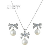 SINZRY-joyería Coreana de color blanco, Circonia cúbica con lazo, colgante simulado de perlas, conjunto de joyas de pendiente y collar, regalo de Navidad 2024 - compra barato