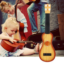 Ukelele de 14,5 pulgadas para principiantes, 4 cuerdas de nailon, guitarra Musical para niños y niñas, regalos de navidad 2024 - compra barato