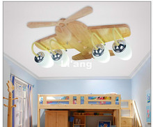 Envío Gratis lámpara de techo de dibujos animados de avión de madera L57cm luces LED de techo 110V 220V AC niños dormitorio encantador lámparas de techo LED 2024 - compra barato