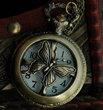 Оптовая продажа, карманные часы с бабочкой, ожерелье хорошего качества, модные ретро новые винтажные бронзовые вращающиеся часы с цепочкой 2024 - купить недорого
