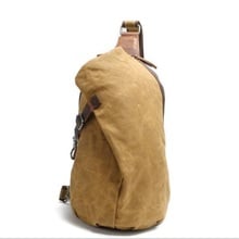 Envío Gratis moda lienzo de estudiante mochila bien lienzo bolsa de viaje de cuero portátil mochila Estilo vintage bag.37 * 23*13cm 2024 - compra barato