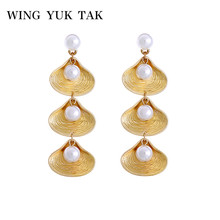 Wing yuk tak, pendientes de concha de aleación para mujer, diseño único, Perla simulada, pendiente de gota, accesorios de joyería de moda 2024 - compra barato