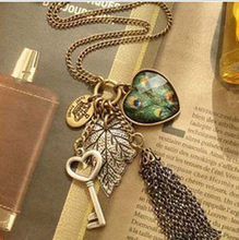 Популярное длинное ожерелье с подвеской в стиле ретро, с павлиньими перьями, листочками, ключ от сердца 2024 - купить недорого