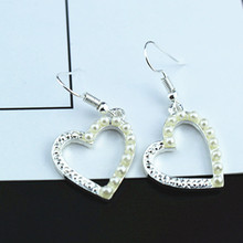 wholesale  Korean jewelry wholesale Korean version of the new love fashion pearl earrings earrings pierced heart girl 2024 - buy cheap