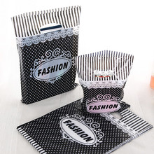 100pcs/lot 15x20cm Black White"Fashion" Pattern Plastic Handle Gift Bags New Style Wedding Gift Bags Packaging Bags With Hnadle 2024 - buy cheap