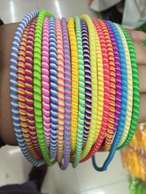 10 unids/lote de protectores de cable, organizador de envoltura de cable, Anillo para el cabello, Cargador USB en espiral de TPU de Color sólido de tres colores, nuevo 2024 - compra barato