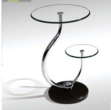 Небольшой чайный столик из закаленного стекла. Телефон. Диван. Круглый стол 2024 - купить недорого