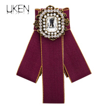 Uken strass imitação de pérola emblema vestido camisa broches pino laço vestido mulheres joias de casamento acessórios 2024 - compre barato