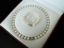 Juego de joyas de perlas de concha perfecta, collar de perlas Concha redonda blanca de 10mm, pendientes de pulsera con imán de estrás, broche de regalo para mujer 2024 - compra barato