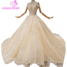 2018 nuevo Champagne Lace sin mangas cuello pico Catedral tren boda Vestido de bola fuera del hombro vestidos de novia tipo princesa vestidos 2024 - compra barato