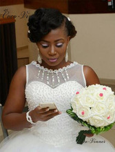 Vestido de novia africano sin mangas con cuello redondo, encaje blanco puro, tallas grandes, vestidos de boda perlas, vestido de novia W0438 2024 - compra barato