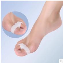 Alisadores de Gel para el cuidado de los pies, 1 par, 2 orificios, separador de dedos, Hallux Valgus, Corrector de juanetes, alivio del dolor 2024 - compra barato