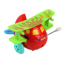 Creativo clásico reloj juguetes avión forma viento juguete bebé juguete niños bebé divertido Avión de juguete de regalo de color al azar 2024 - compra barato