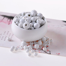 50 unids/lote 6 8 10 12 14MM Retro granos en cerámica redondos DIY/porcelana artesanal agujero de cuentas espaciador perlas para la fabricación de la joyería al por mayor 2024 - compra barato