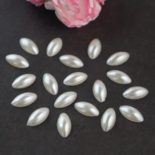 DIY 1000 unids/bolsa Blanco/Marfil mitad caballo forma de ojo de ABS perlas de imitación arte de uñas decoraciones para 3D las uñas herramientas de joyería 2024 - compra barato