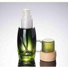 Botella vacía de vidrio verde con botella dispensadora con pulsador, tapa de madera para bote para crema, 40g, botella de emulsión cosmética, 3 unids/lote 2024 - compra barato