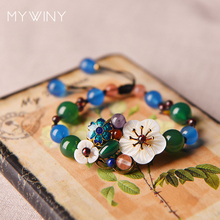 MYWINY piedra de moda natural Shell flor étnicos pulseras de cristal de la joyería de las mujeres hecho a mano goteo de aleación de cloisonne de la joyería 2024 - compra barato