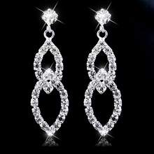 Pendientes colgantes con forma de hoja para mujer, aretes largos de cristal con diamantes de imitación de Color Plata brillante, joyería de boda 2024 - compra barato