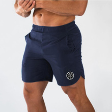 Muscleguys-pantalones cortos ajustados para hombre, pantalón de chándal para Fitness, culturismo, secado rápido 2024 - compra barato