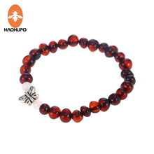 HAOHUPO Baltic Amber Teething Bracelets with Rose Quartz Baby Amber Jewelry Adults Gifts Elastic Fine Jewelry Butterfly Pulseras 2024 - buy cheap