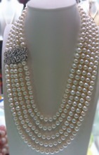 Venta al por mayor 4 filas naturales AA 7-8mm collar de perlas blancas de agua dulce 005 2024 - compra barato
