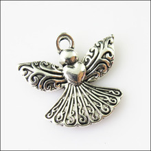 Colgante de alas de Ángel en forma de corazón, 12 Uds., Color plata tibetana, 21x23mm 2024 - compra barato