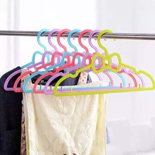 5PCs/Lot New Baby bowknot hanger child clothes pegs plastic kids clothes hangers for clothes drying rack cloth hanger storage 2024 - buy cheap