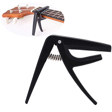 Ukelele profesional Capo de una sola mano, cambio rápido, piezas y accesorios de guitarra negra de acero y plástico 2024 - compra barato