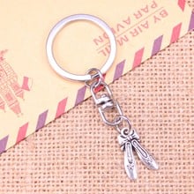 20pcs New Fashion Keychain 20x13mm ballet shoes slippers Pendants DIY Men Jewelry Car Key Chain Ring Holder Souvenir For Gift 2024 - compre barato