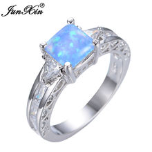 JUNXIN-Anillo de piedra de ópalo de Fuego Azul para hombre y mujer, sortija de boda Vintage, Simple, a la moda 2024 - compra barato