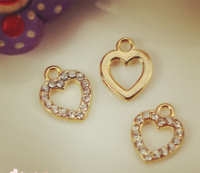 Wholesale Trendy Rhinestone decoration alloy gold-color  hollow out hearts shape charms diy earring/necklace/bracelet pendants 2024 - buy cheap