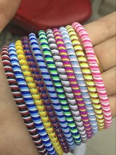 50pcs/lot Good gift Three Colors Solid Color TPU spiral USB Charger cable cord protector wrap cable winder organizer, Hair ring 2024 - buy cheap