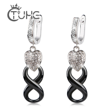 Pendientes de tuerca con forma de U Infinity para mujer, aretes de cerámica de buena calidad con corazón de cristal brillante Negro infinito para mujer 2024 - compra barato