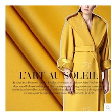 Tela de lana de doble capa de Cachemira de color amarillo brillante, abrigo grueso, tela de algodón/algodón, venta al por mayor 2024 - compra barato