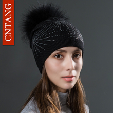 Вязаные шерстяные шапки CNTANG Стразы 2021 с помпоном из натурального меха енота, осенне-зимняя теплая шапка для женщин, модные шапки 2024 - купить недорого