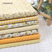 TIANXINYUE-7 unidades/lote de tela de algodón 100% de color amarillo para coser bolsas de niños, juguetes para bebés DIY con flores y puntos 2024 - compra barato