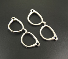 10 Uds. Marco de gafas de ojo de Color plateado, conectores de colgantes para hallazgos de joyería 56x20mm A585 2024 - compra barato