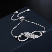UMGODLY-pulsera de plumas de lujo para mujer, piedras de circón, amuletos con forma infinita de la suerte, brazalete, regalo de joyería 2024 - compra barato
