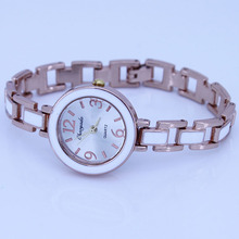 Nova marca popular moda redonda lady feminino menina rosa pulseira de ouro vestido de quartzo relógio de pulso bateria incluída nova o30 pulseira relógio 2024 - compre barato