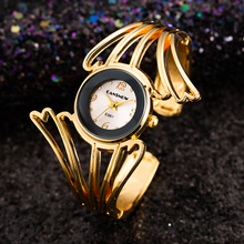 Reloj de pulsera de Diseño de alas para mujer, cronógrafo analógico de cuarzo, de acero completo, elegante, nuevo, 2021 2024 - compra barato