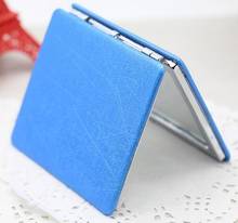Портативное карманное зеркало из полиуретана, компактное зеркало для макияжа с красочным складным двухсторонним металлическим дизайном ноутбука 2024 - купить недорого