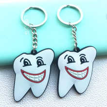 Free shipping 20pcs Molar Tooth Rubber Smile Face KEYCHAINS for Dental clinic Gift 2024 - buy cheap