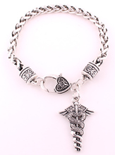 Hot Selling rhodium plated zinc studded with sparkling crystal Caduceus Medical Symbol Staff  with wings snakes charm bracelet 2024 - buy cheap