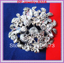 Broche de moda con broche de Yiwu Floral de aleación de diamantes de imitación Chapado en plata 2024 - compra barato