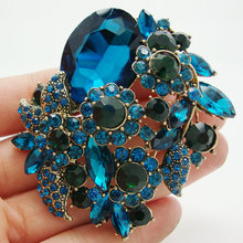 Broche de cristal con diseño de hojas y flores para mujer, broche colgante con diseño de hojas y flores, color azul, con diamantes de imitación 2024 - compra barato