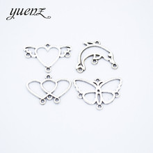 YuenZ-abalorio de 25 uds para collar, accesorio de Metal con forma de corazón hueco, mariposa, Delfín, color plateado antiguo, bricolaje, fabricación de joyas, U016 2024 - compra barato